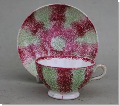 SPLATTER WARE CUP  & SAUCER.